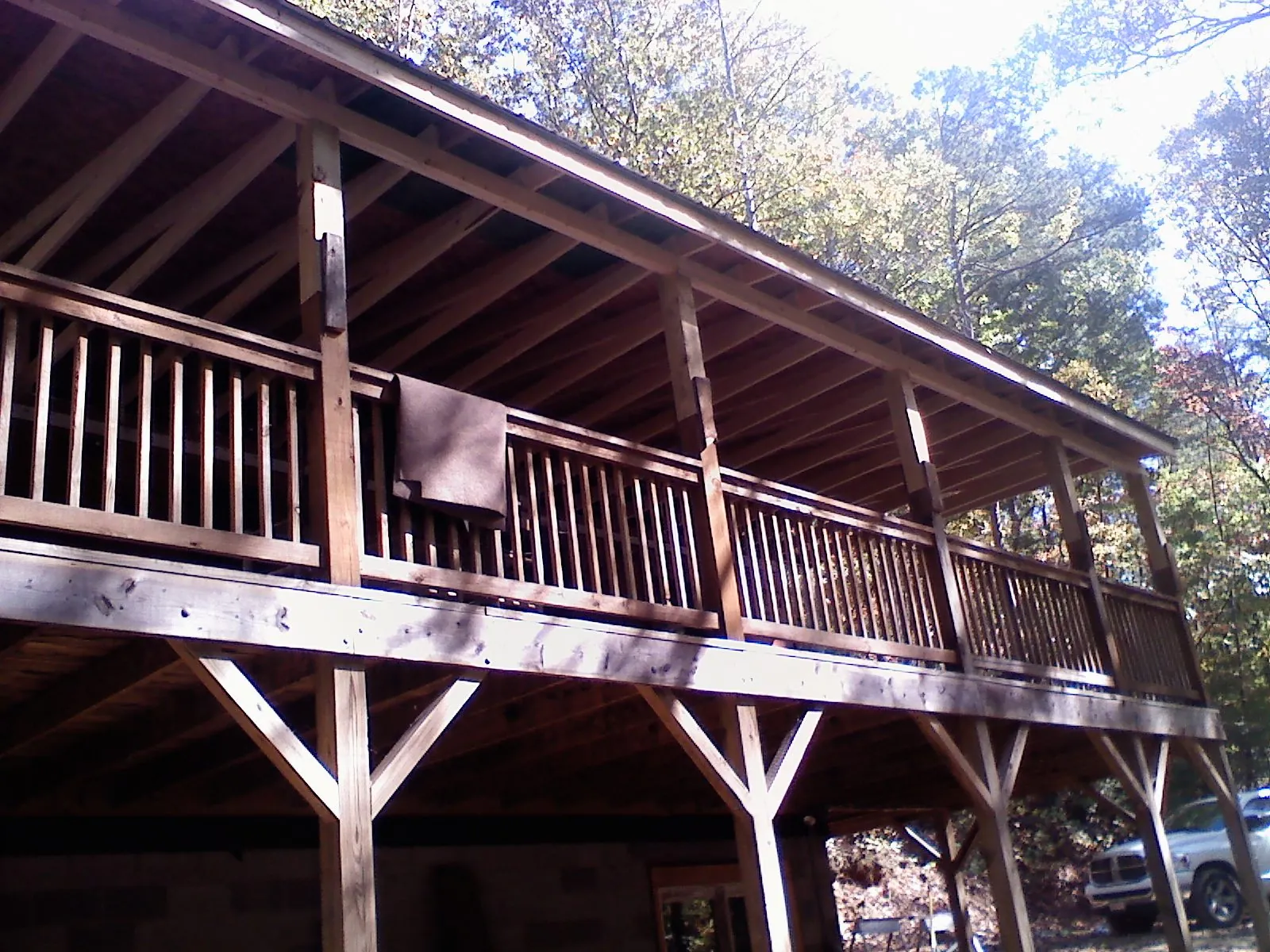 Timber framing under a new elevated porch and deck — Roof Leak Repair in Flat Top by Roofing Brothers